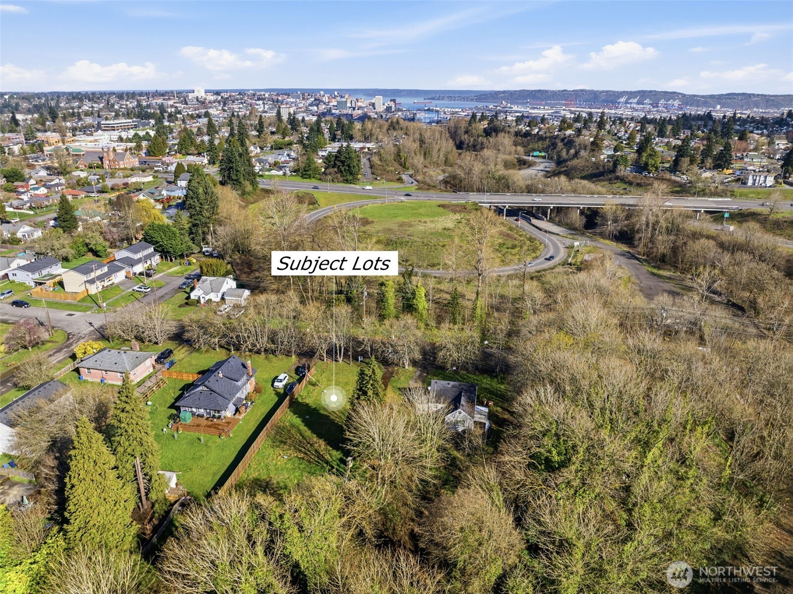 324 East 40th Street Tacoma, WA 98404 - Photo 6 of 17 a view of residential houses with outdoor space and river