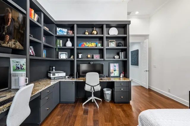 a bedroom with a bed furniture and a window