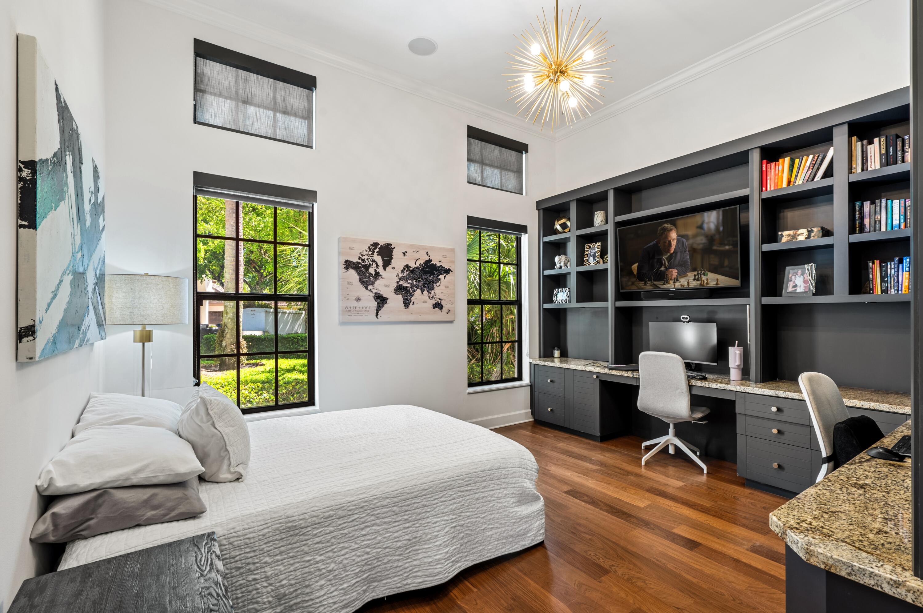 3098 Northwest 60th Street Boca Raton, FL 33496 - Photo 18 of 30 a bedroom with a bed furniture and a window