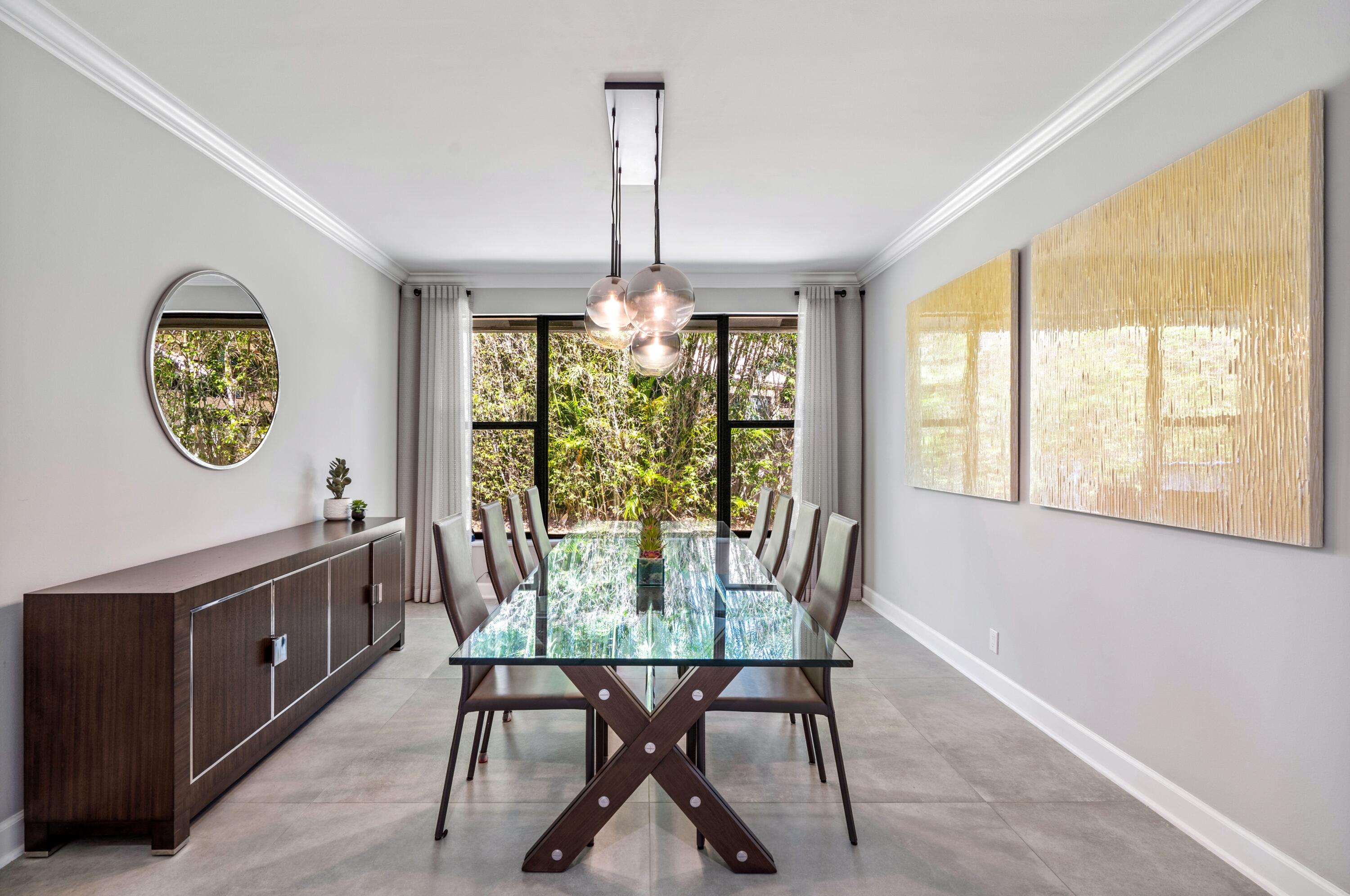 3098 Northwest 60th Street Boca Raton, FL 33496 - Photo 7 of 30 a view of a dining room with furniture window and outside view