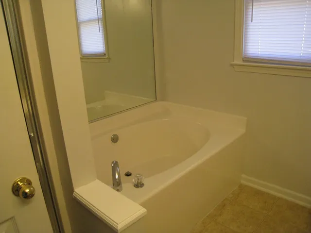 a bathroom with a sink and a tub