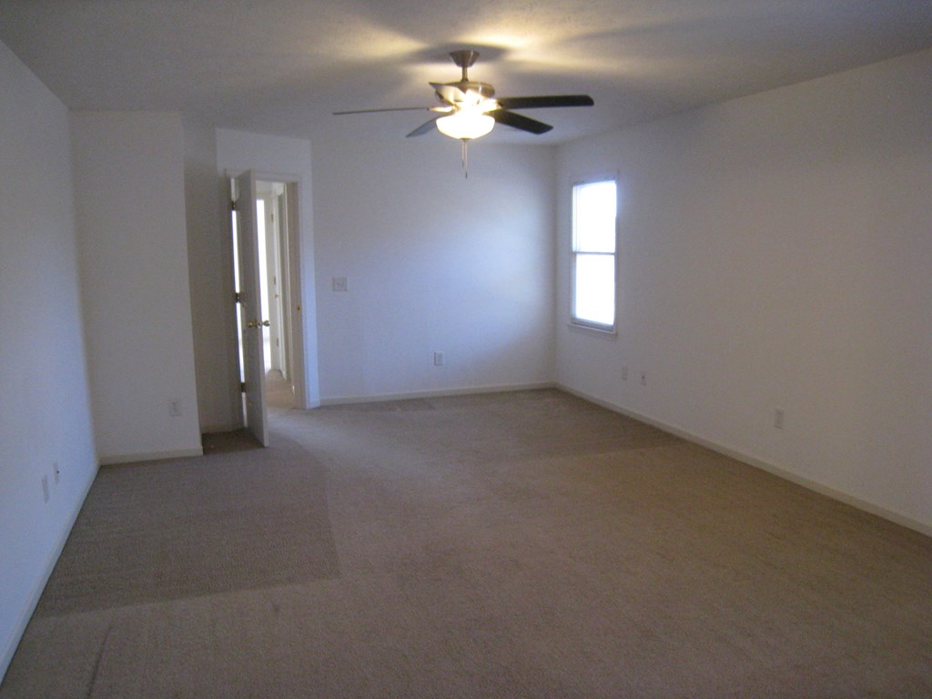 3371 Flintlock Drive Columbus, GA 31907 - Photo 10 of 14 a view of an empty room with a window