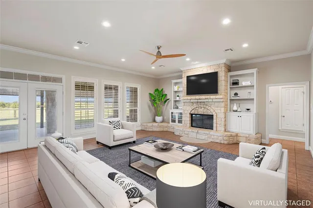 a view of kitchen with furniture and a large window