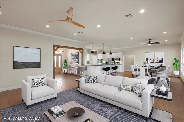 a kitchen with kitchen island white cabinets and white appliances