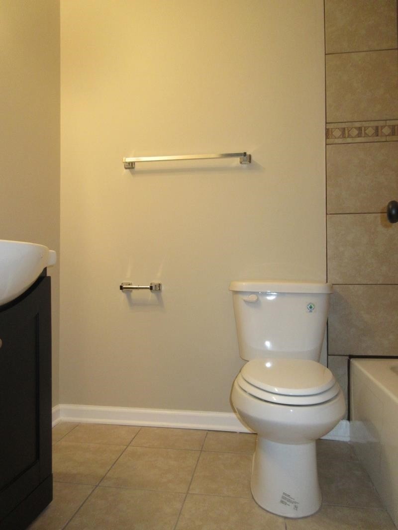 4202 Crain Road Memphis, TN 38128 - Photo 5 of 16 a bathroom with a toilet and a shower