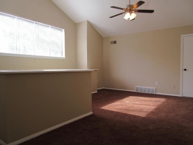 4202 Crain Road Memphis, TN 38128 - Photo 10 of 16 a view of an empty room with a window