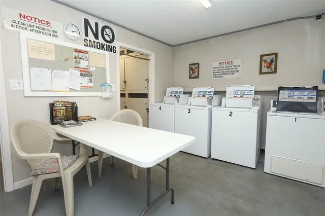 an aerial view of a house with a swimming pool