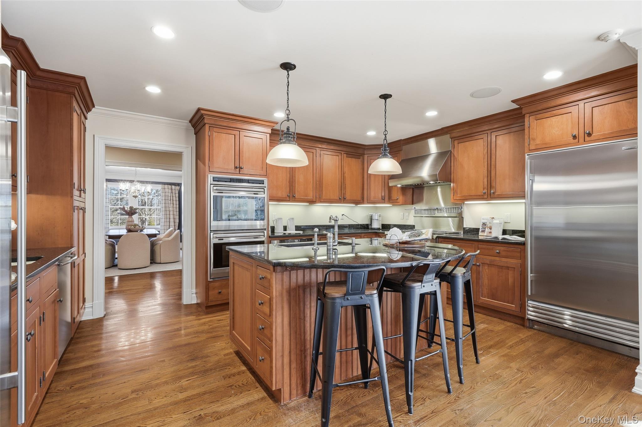 365 Grace Church Street Rye, NY 10580 - Photo 11 of 44 Eat in Kitchen with island seating for 3, stainless steel appliances including 2 dishwashers and separate Sub zero refrigerator and freezer