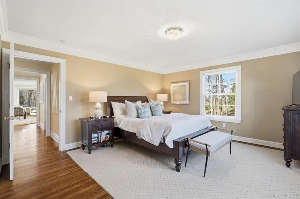 a bed room with a bed and a window