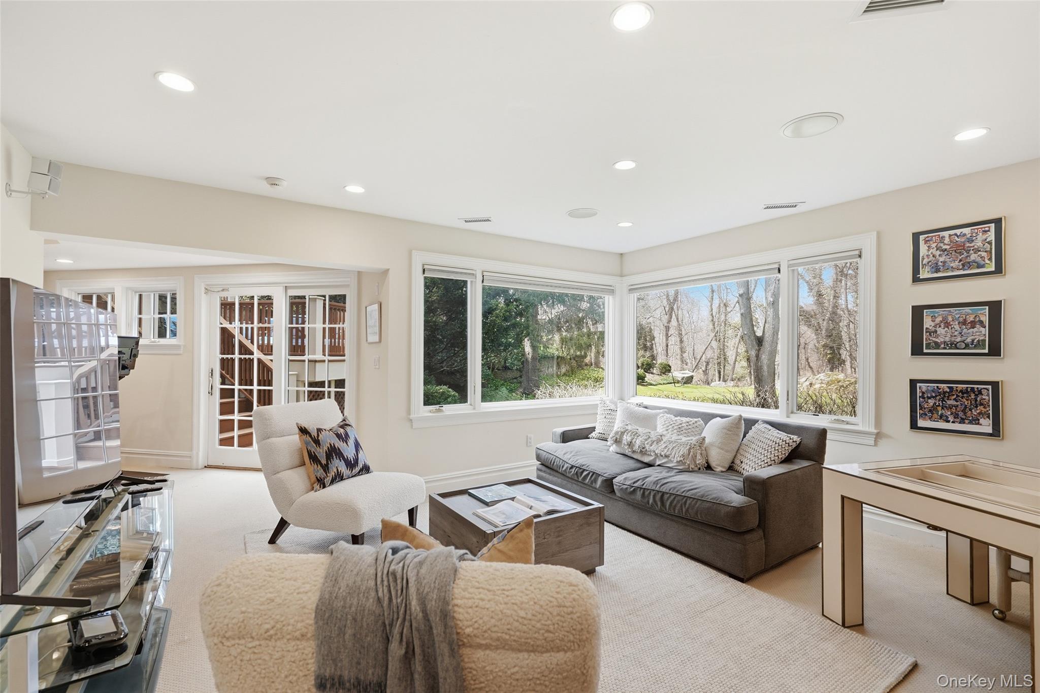 365 Grace Church Street Rye, NY 10580 - Photo 28 of 44 Lower level walkout Recreation Room with doors out to backyard