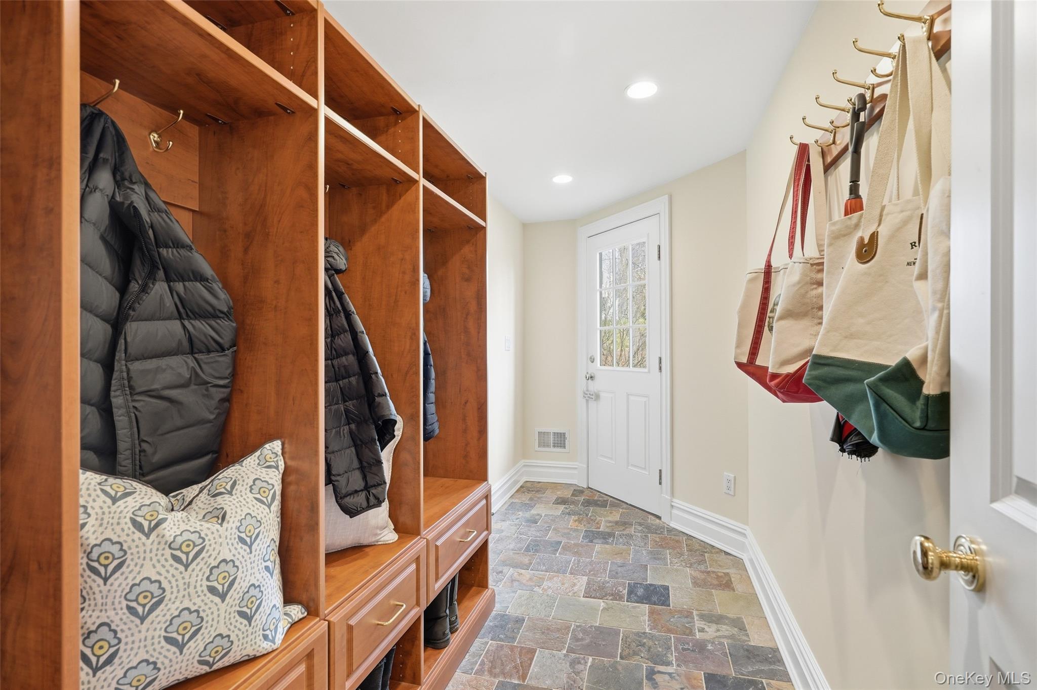 365 Grace Church Street Rye, NY 10580 - Photo 31 of 44 On-grade Mudroom with cubbies, easily accessible from driveway as well as 2 car garage