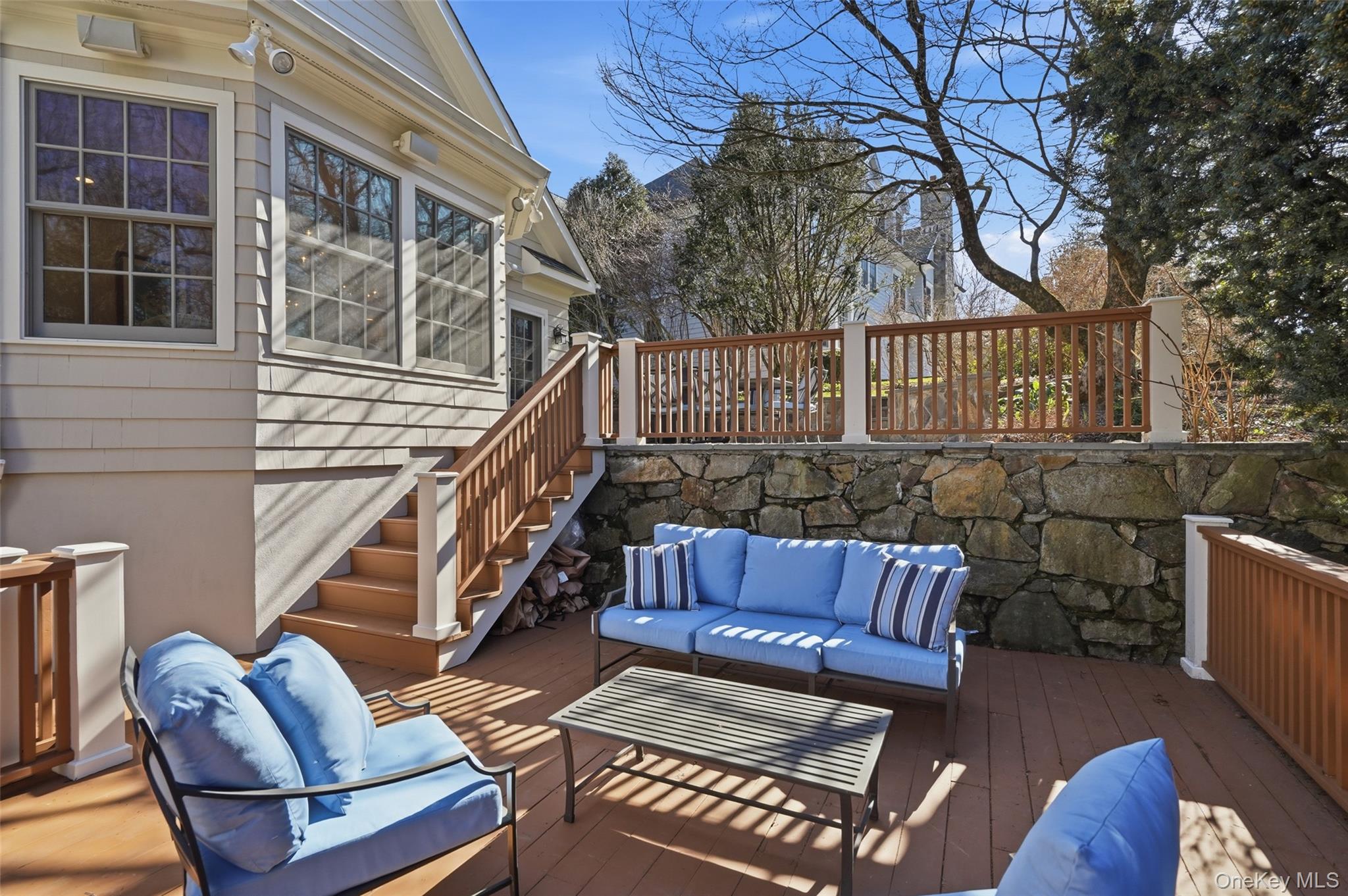 365 Grace Church Street Rye, NY 10580 - Photo 34 of 44 The home features a multi-level Grilling/Dining Terrace above with stairs down to the Lounging Deck