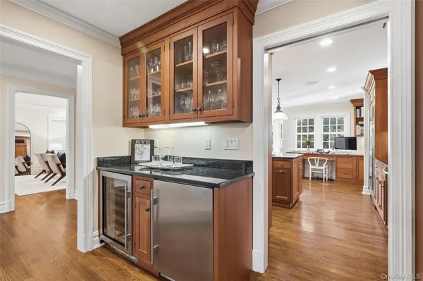 a kitchen with stainless steel appliances granite countertop a stove and cabinets