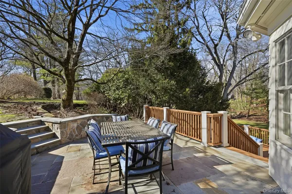a view of a patio with a yard