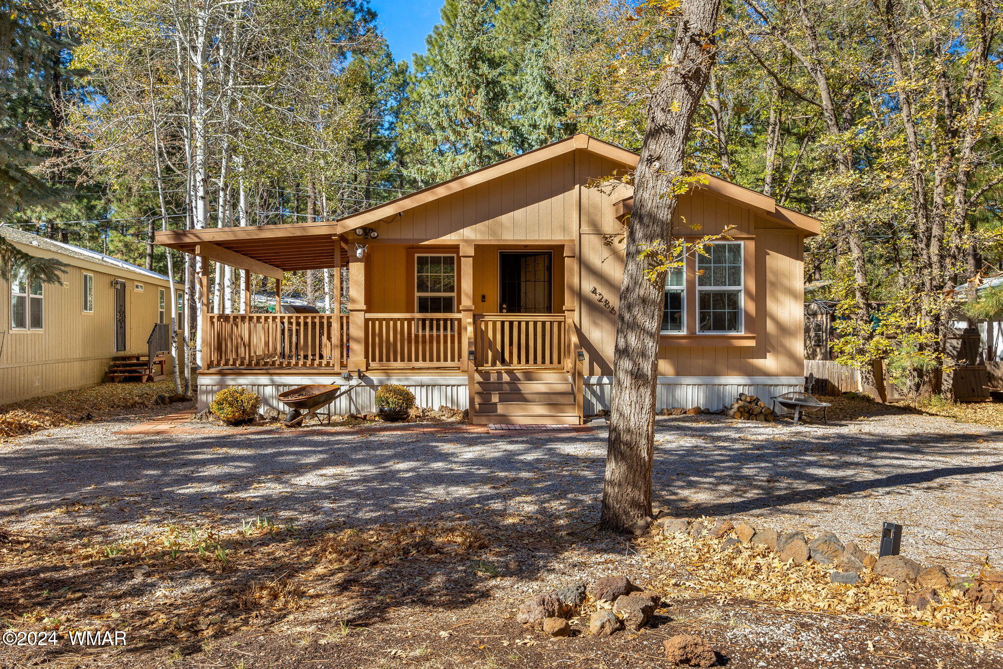 4286 East Blue Ridge Loop Pinetop, AZ 85935 - Photo 1 of 29 a view of a house with a patio