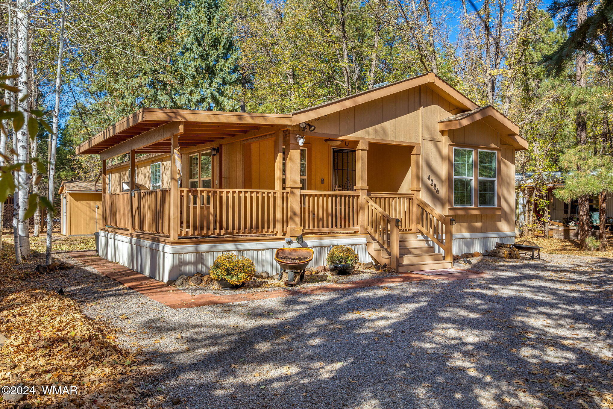 4286 East Blue Ridge Loop Pinetop, AZ 85935 - Photo 3 of 29 a view of a house with a yard