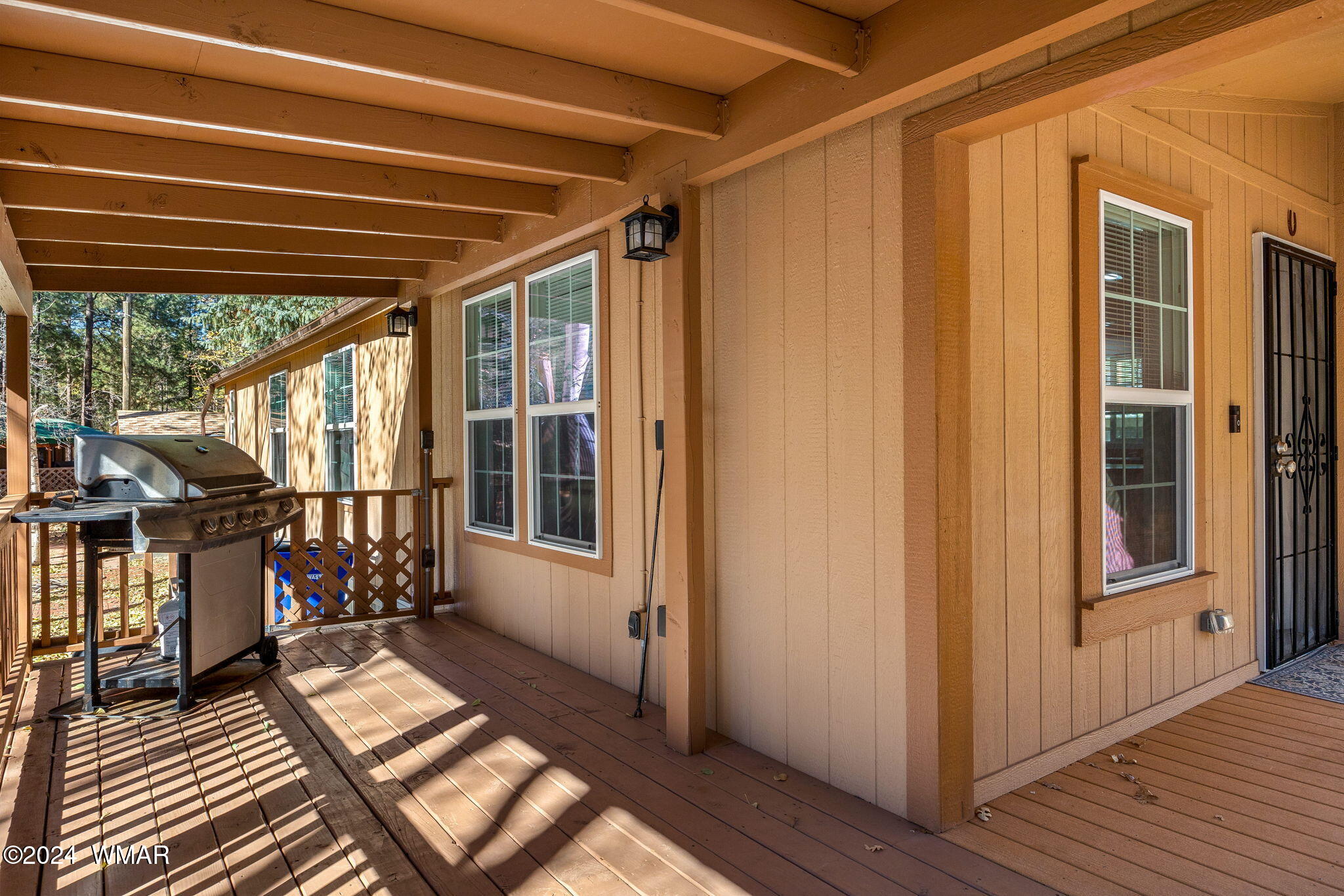 4286 East Blue Ridge Loop Pinetop, AZ 85935 - Photo 5 of 29 a view of a balcony with wooden floor