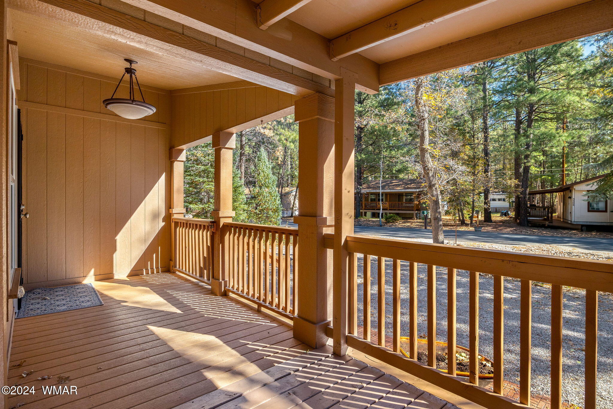 4286 East Blue Ridge Loop Pinetop, AZ 85935 - Photo 6 of 29 a view of a porch with wooden floor and outdoor space