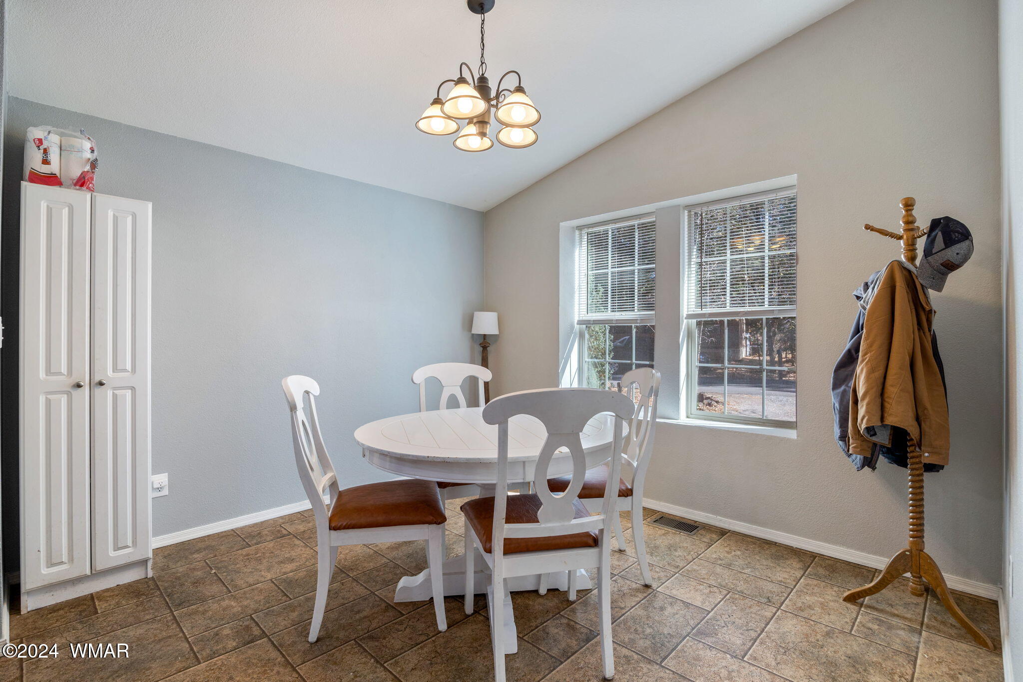 4286 East Blue Ridge Loop Pinetop, AZ 85935 - Photo 8 of 29 a dining room with furniture window and chandelier