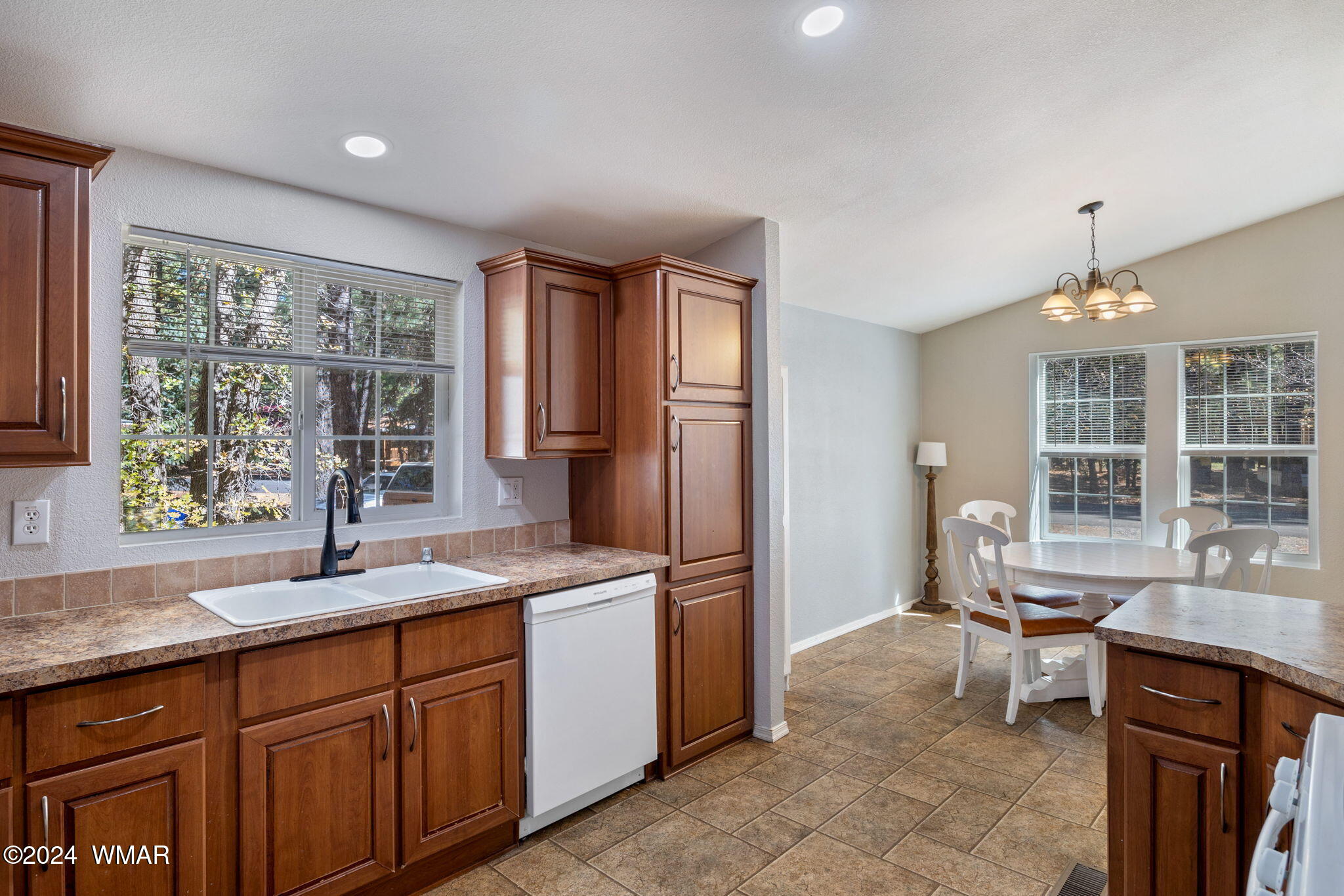 4286 East Blue Ridge Loop Pinetop, AZ 85935 - Photo 10 of 29 a kitchen with sink cabinets and window