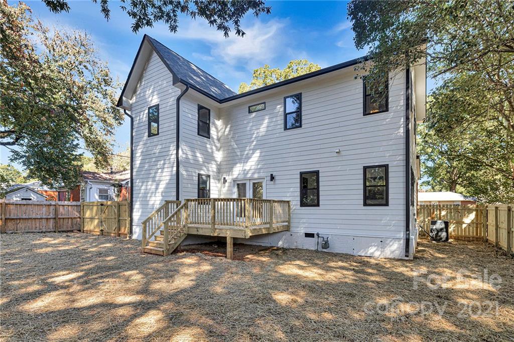 4122 Applegate Road Charlotte, NC 28209 - Photo 16 of 17 a view of a house with a yard
