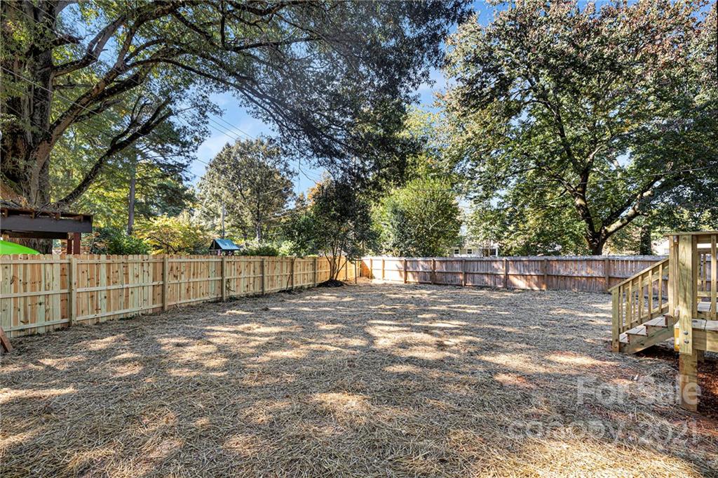 4122 Applegate Road Charlotte, NC 28209 - Photo 17 of 17 a view of a yard with large trees
