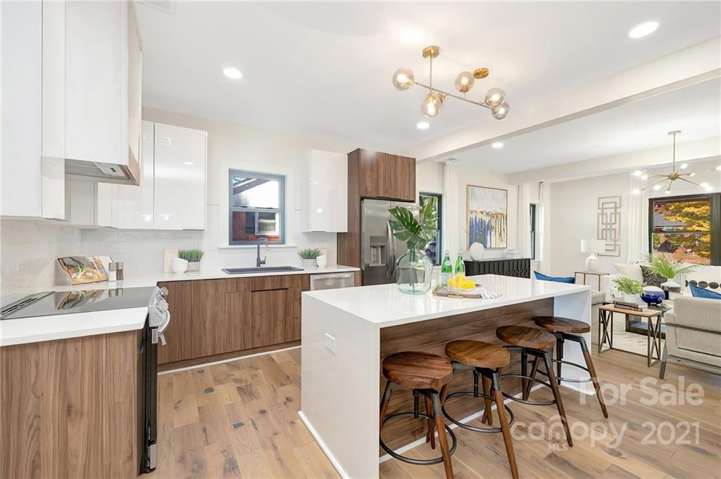 4122 Applegate Road Charlotte, NC 28209 - Photo 5 of 17 a kitchen with a table and chairs in it