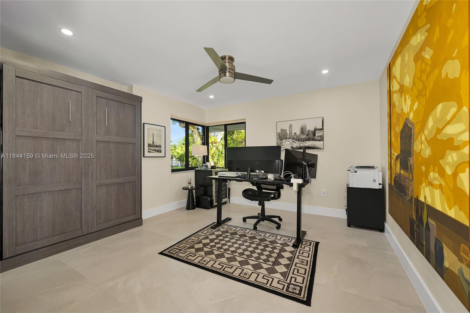 8375 Southwest 78th Street Miami, FL 33143 - Photo 28 of 45 a living room with furniture and a piano