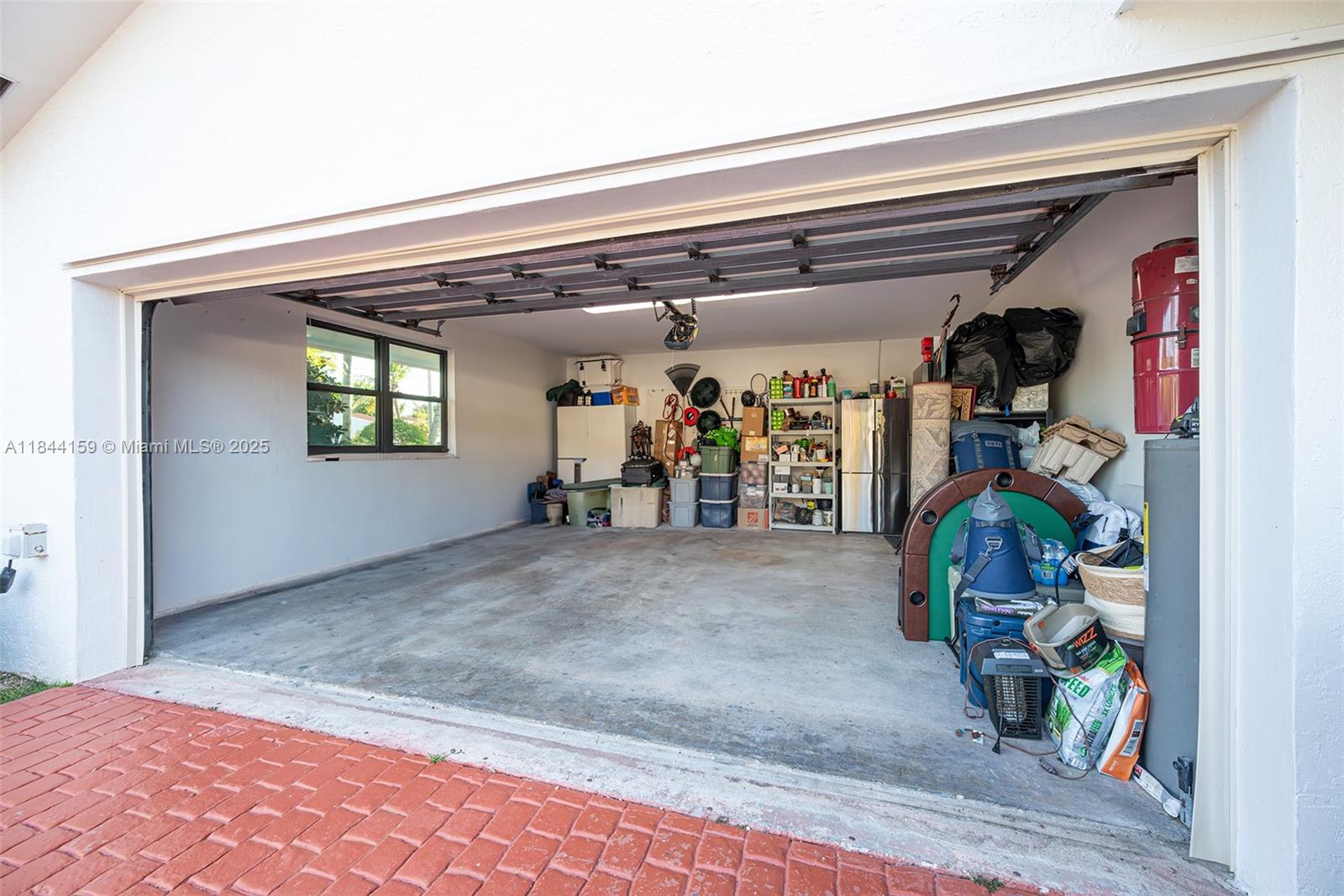 8375 Southwest 78th Street Miami, FL 33143 - Photo 31 of 45 a view of a hallway with a yellow slide in it