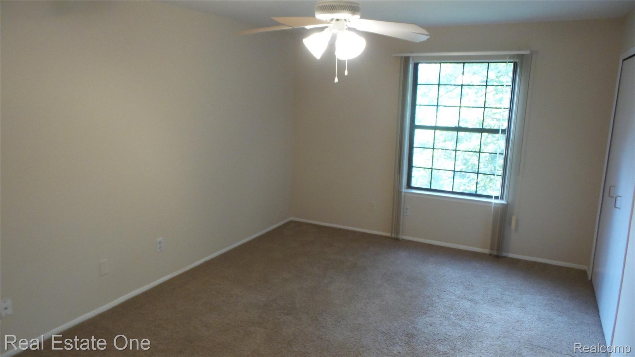 29535 Pine Ridge Circle, Unit 10 Farmington, MI 48331 - Photo 20 of 43 20200805_192640.jpg