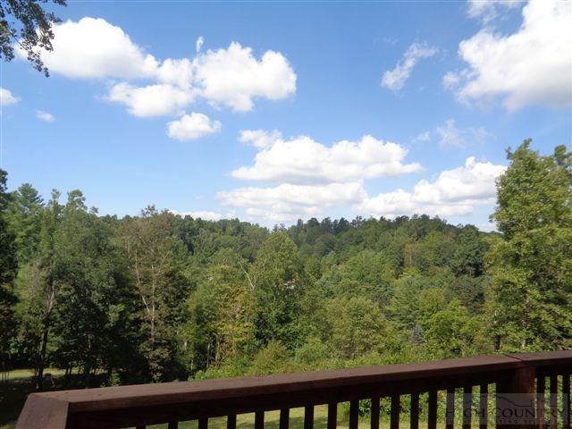 717 F Deep Ford Road Lansing, NC 28643 - Photo 20 of 28 a view of a green yard