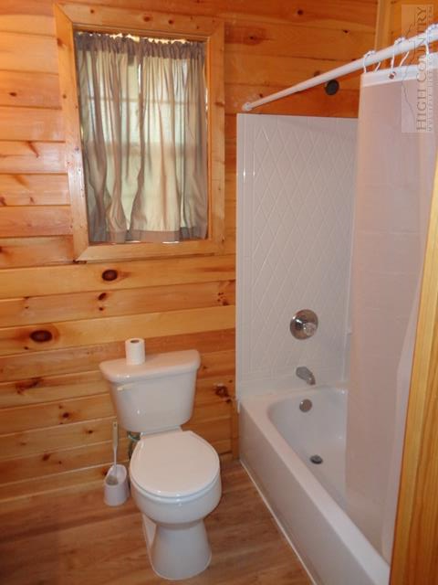 717 F Deep Ford Road Lansing, NC 28643 - Photo 8 of 28 a bathroom with a toilet and a shower