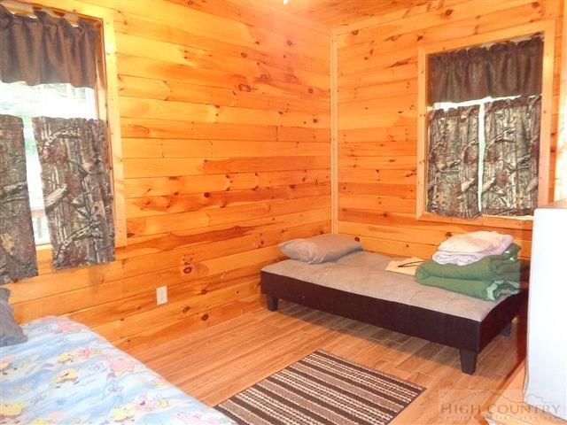 717 F Deep Ford Road Lansing, NC 28643 - Photo 10 of 28 a view of balcony with wooden floor and outdoor space