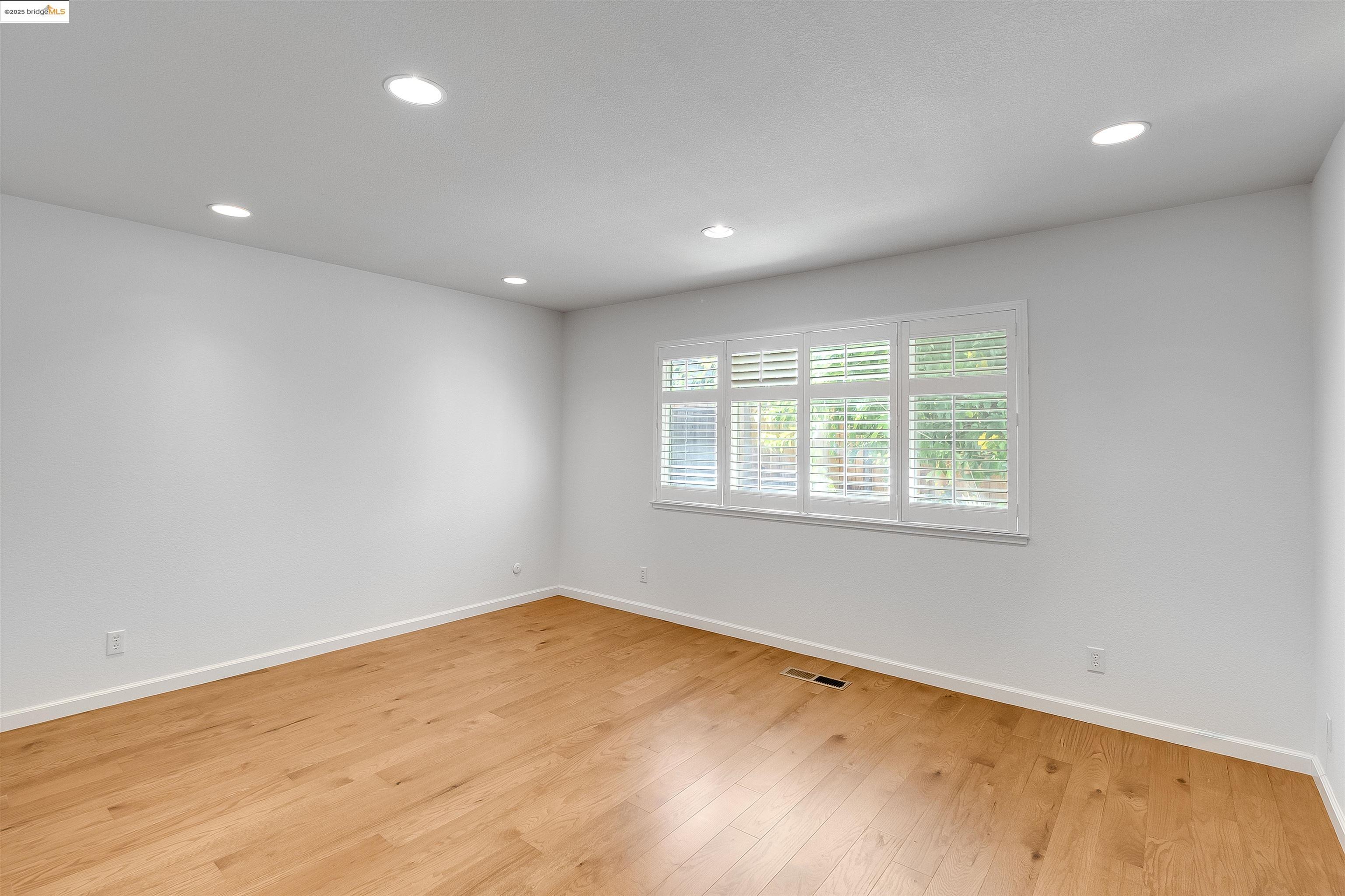 4656 Benbow Court Concord, CA 94521 - Photo 17 of 32 an empty room with a window