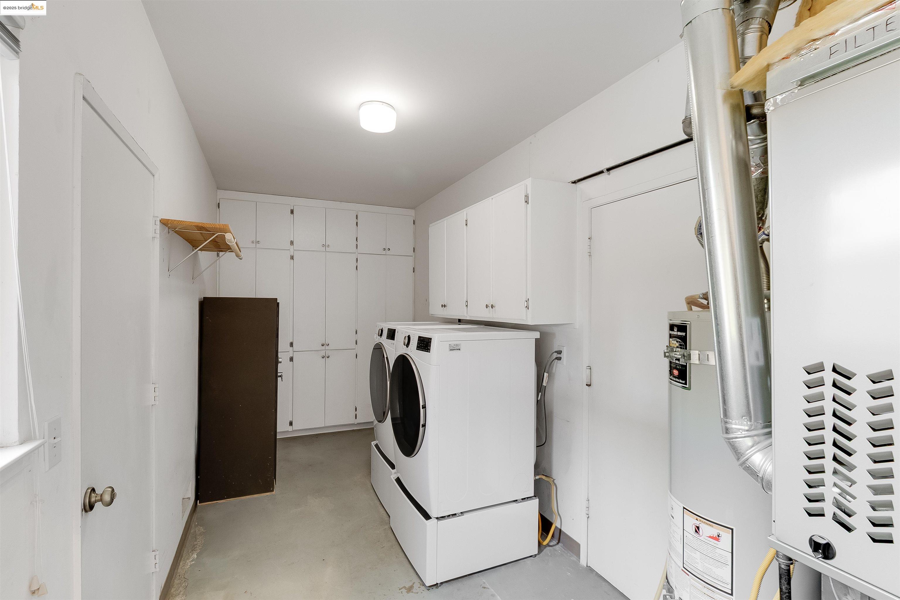 4656 Benbow Court Concord, CA 94521 - Photo 21 of 32 a utility room with refrigerator and washer