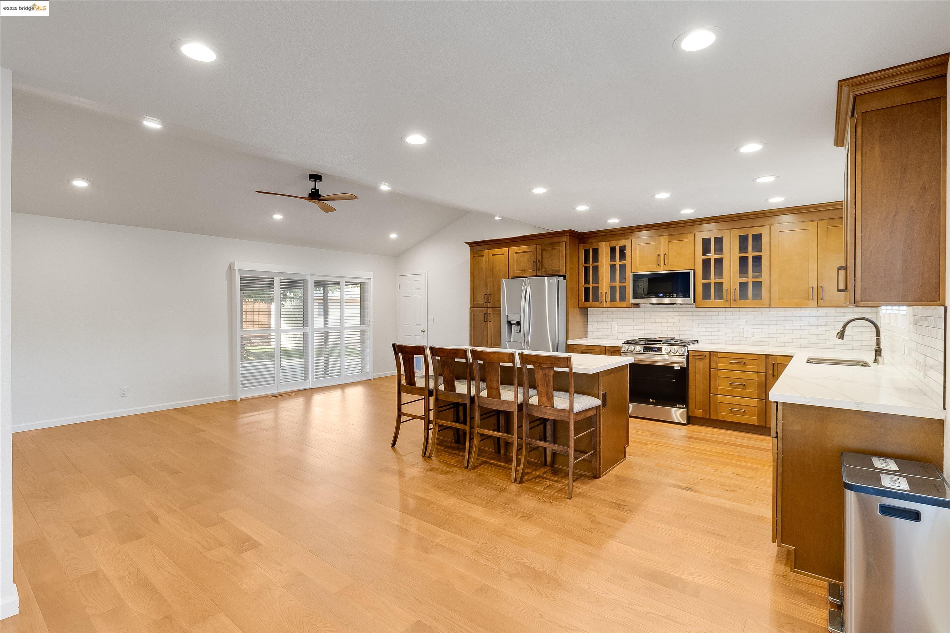 4656 Benbow Court Concord, CA 94521 - Photo 5 of 32 a kitchen with a table and chairs in it