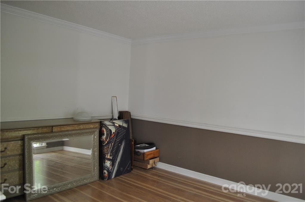 10024 Fireside Lane Charlotte, NC 28215 - Photo 11 of 18 a view of hallway with washer and dryer