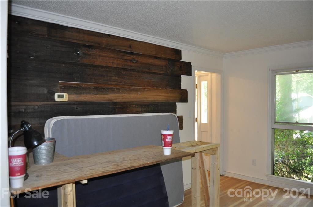 10024 Fireside Lane Charlotte, NC 28215 - Photo 9 of 18 a kitchen with a sink and a window