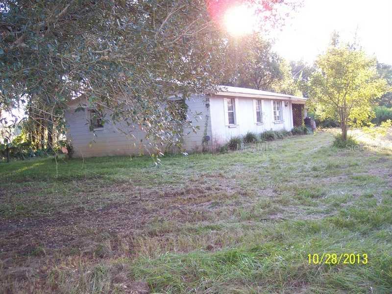 6707 Kinard Road Plant City, FL 33565 - Photo 1 of 1 a view of a house with a yard