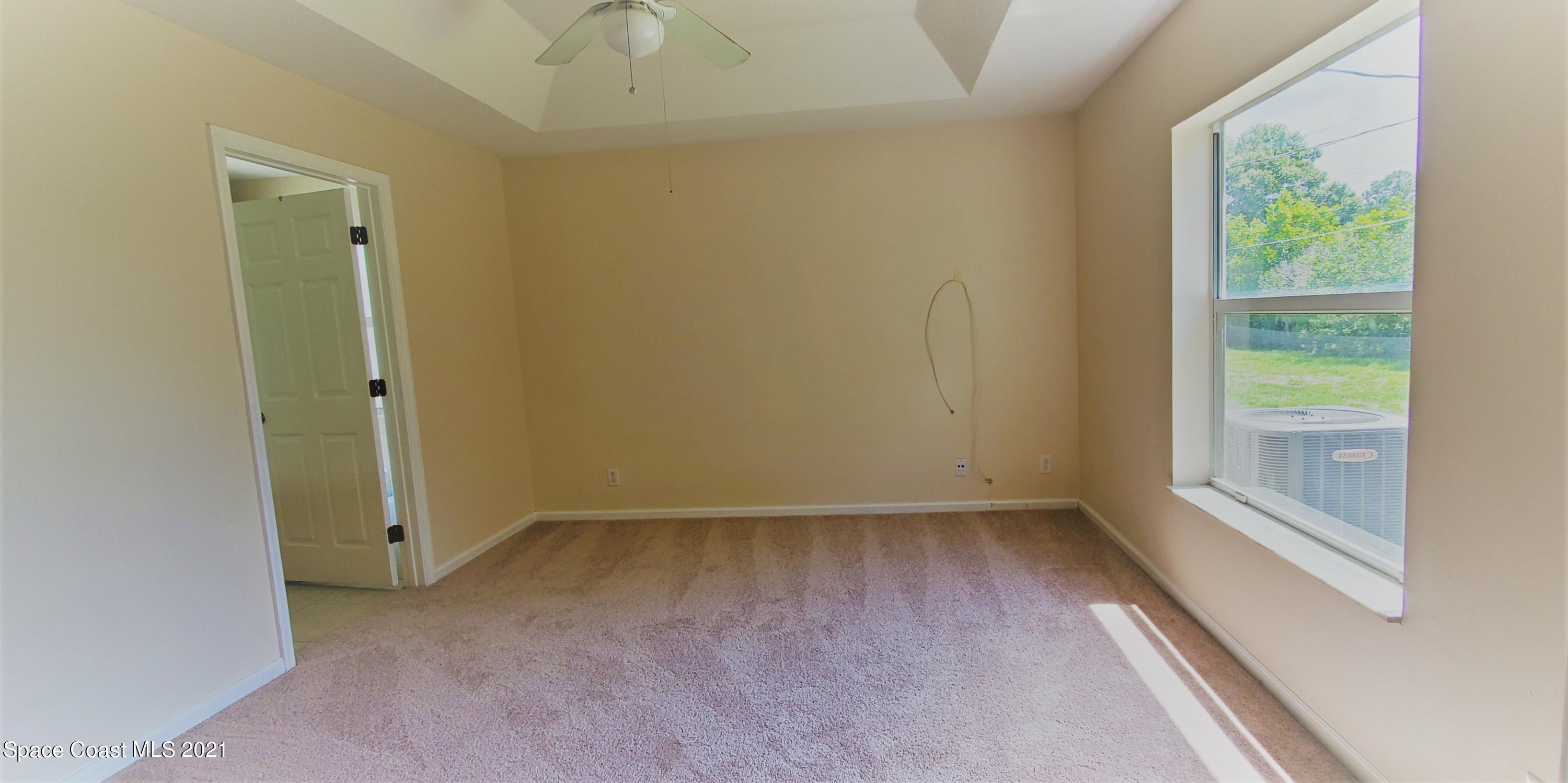 218 San Remo Road Southwest Palm Bay, FL 32908 - Photo 11 of 40 20210628_144300