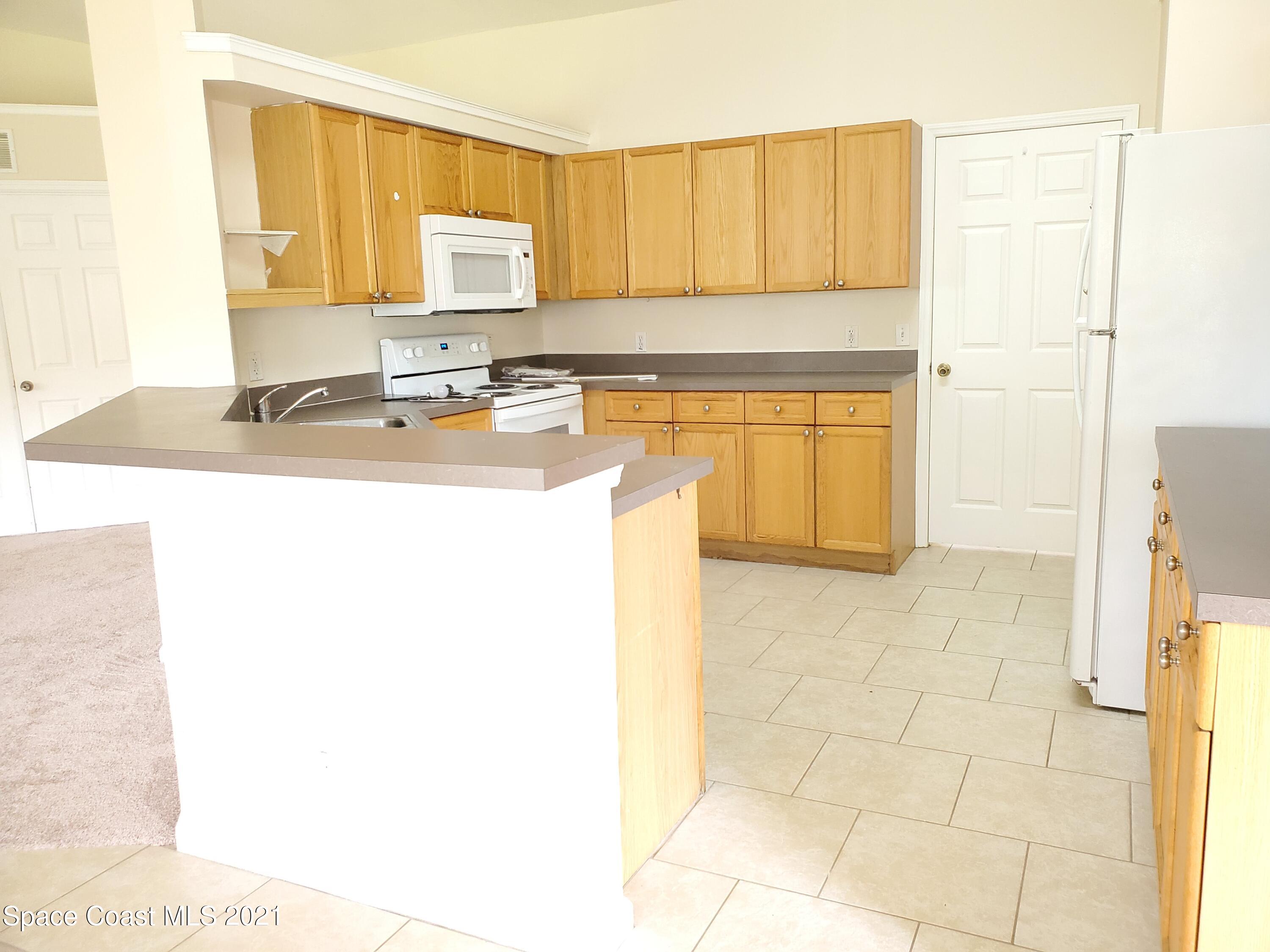 218 San Remo Road Southwest Palm Bay, FL 32908 - Photo 12 of 40 20210628_144535