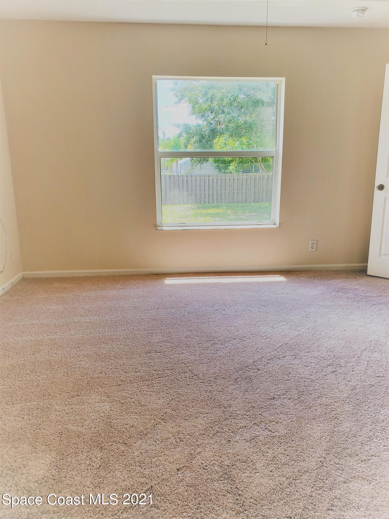 218 San Remo Road Southwest Palm Bay, FL 32908 - Photo 13 of 40 20210628_144442