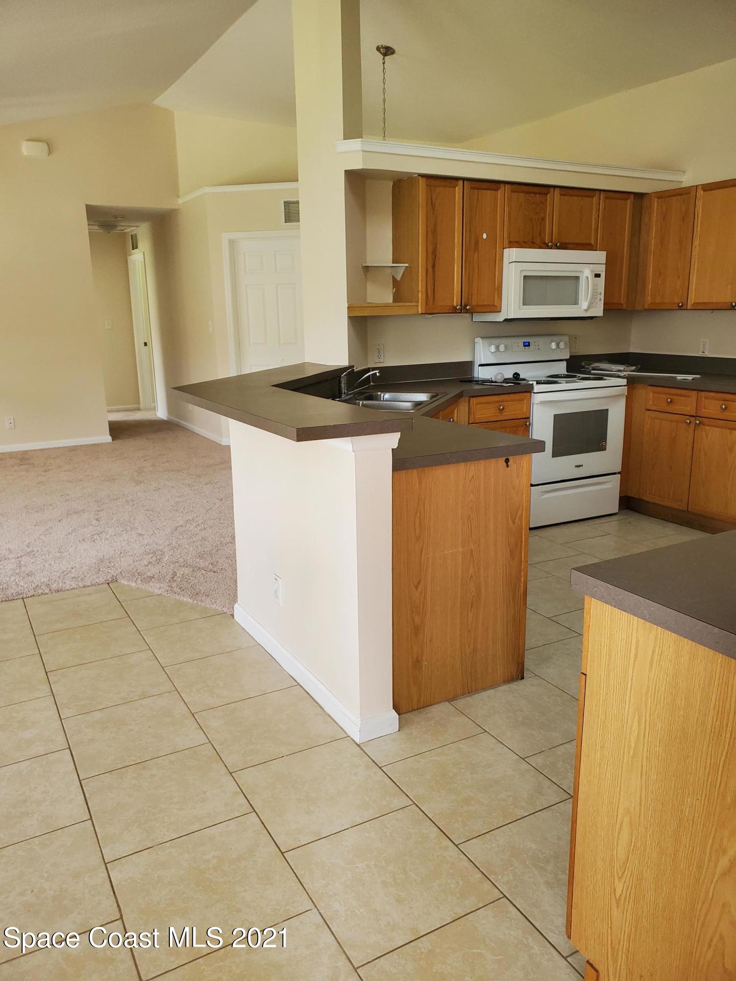 218 San Remo Road Southwest Palm Bay, FL 32908 - Photo 15 of 40 20210628_144457