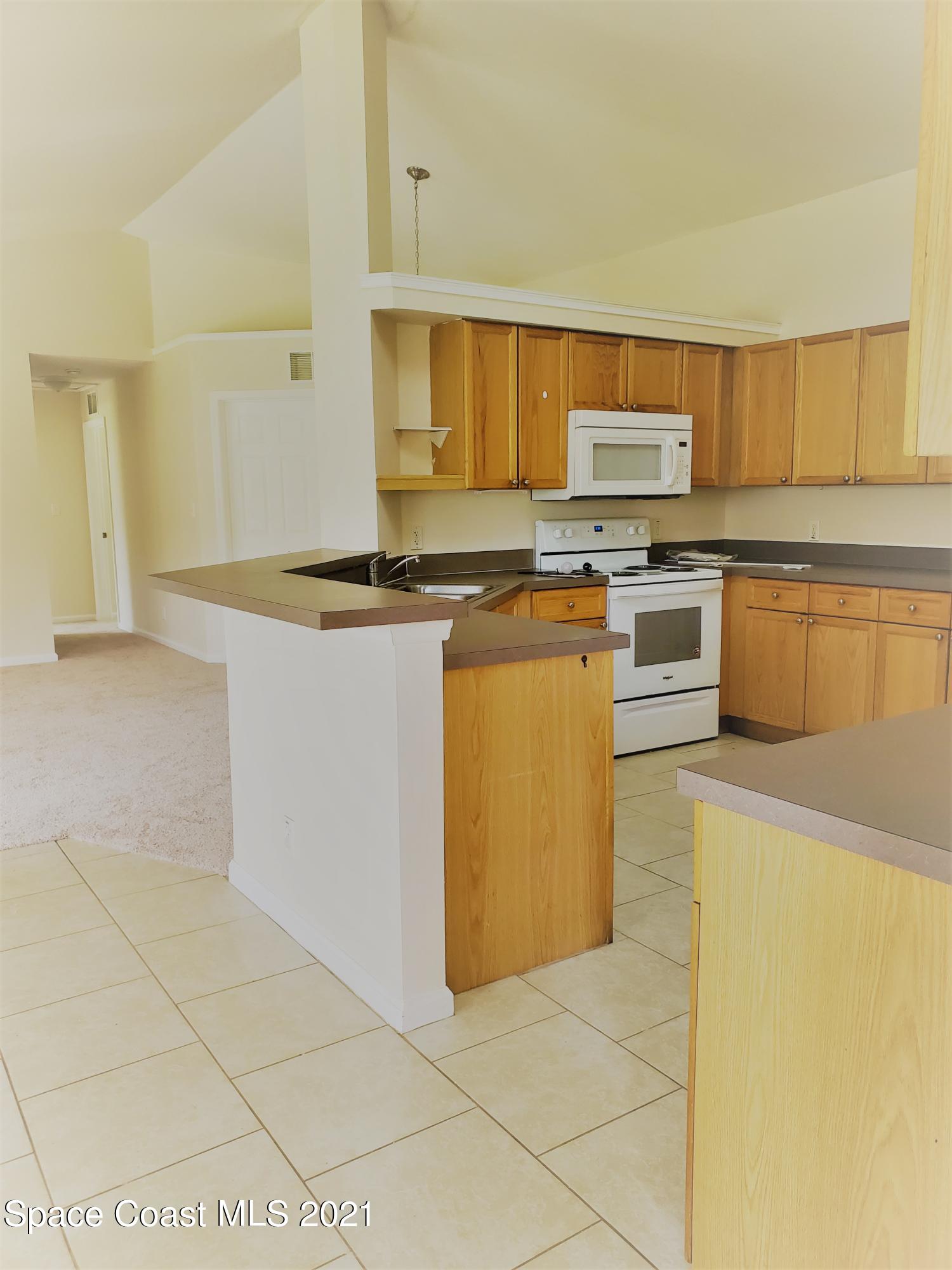 218 San Remo Road Southwest Palm Bay, FL 32908 - Photo 4 of 40 20210628_144454