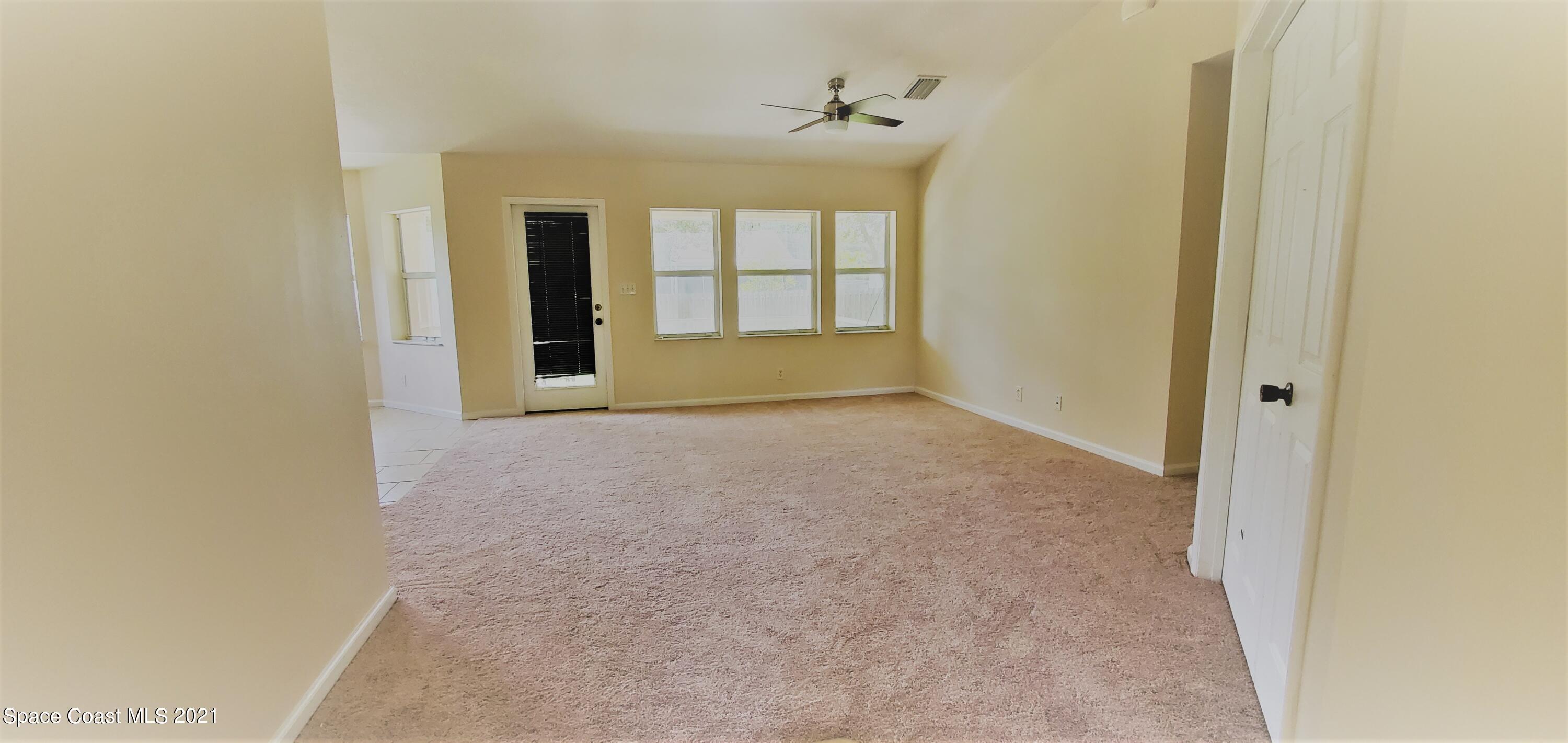218 San Remo Road Southwest Palm Bay, FL 32908 - Photo 7 of 40 20210628_144215