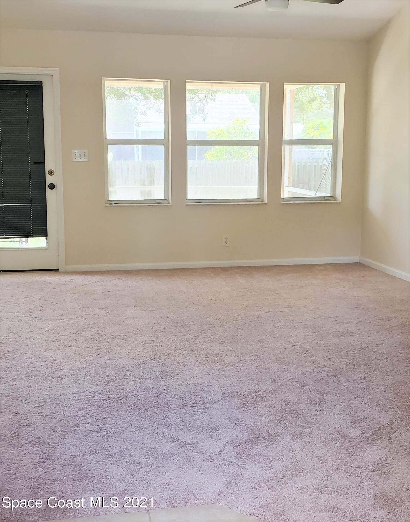 218 San Remo Road Southwest Palm Bay, FL 32908 - Photo 8 of 40 20210628_144225
