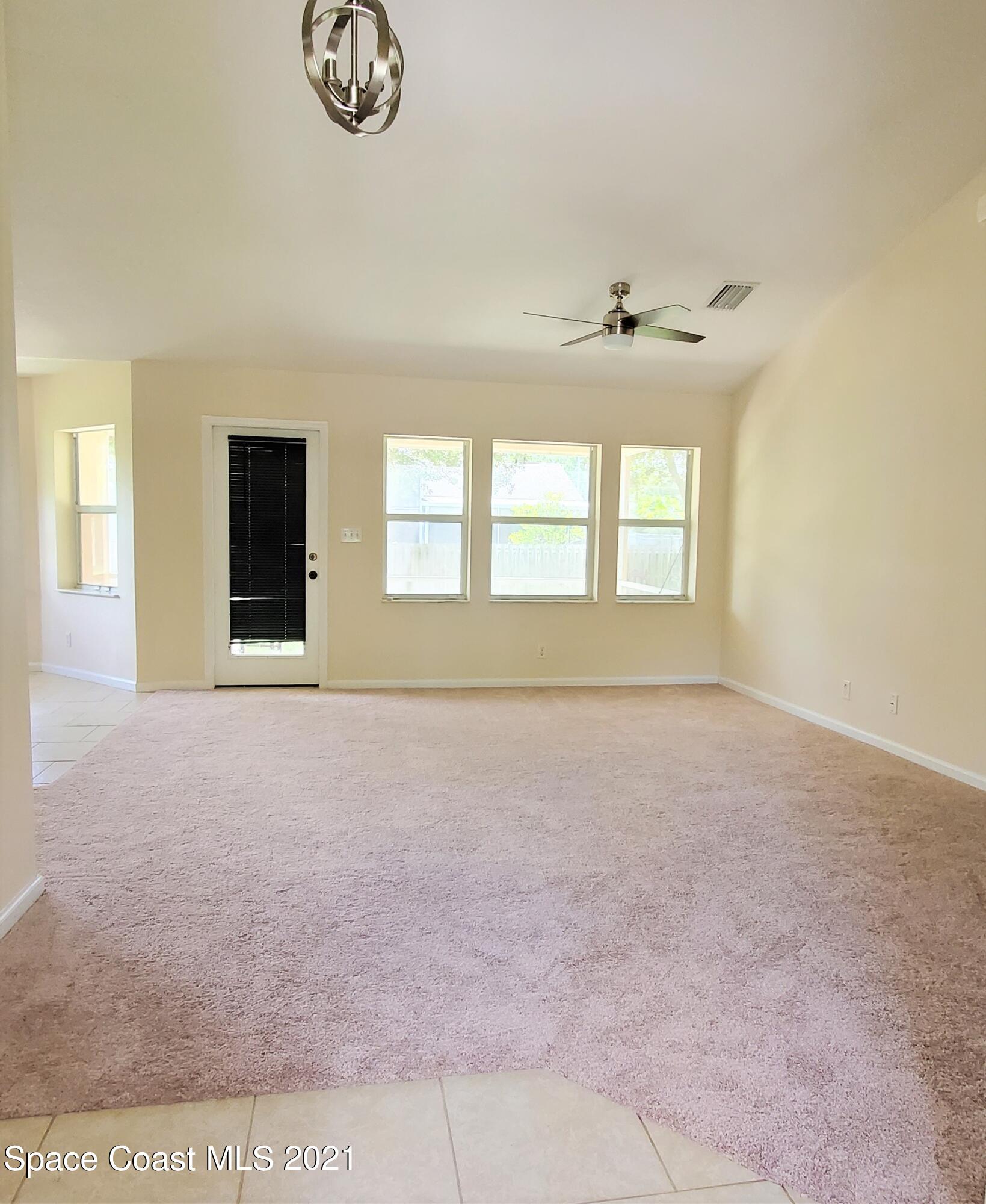 218 San Remo Road Southwest Palm Bay, FL 32908 - Photo 9 of 40 20210628_144232