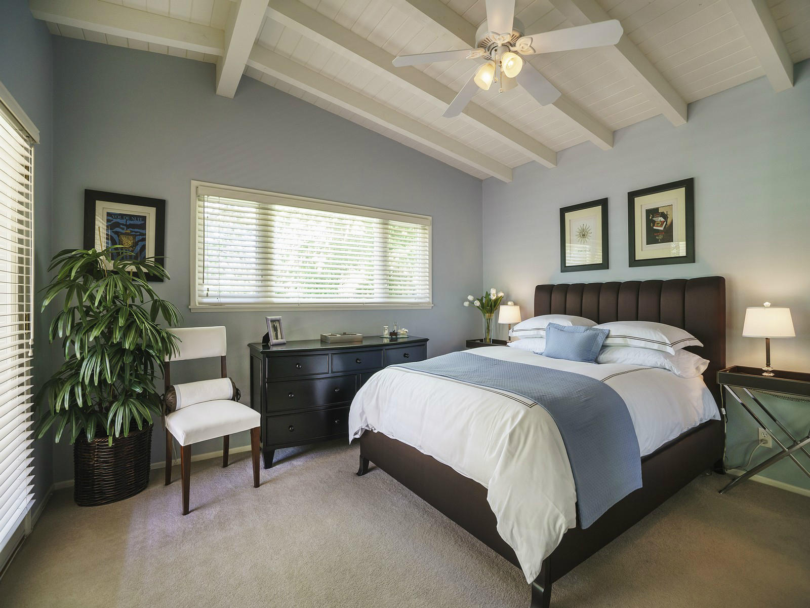 343 Cooper Road Santa Barbara, CA 93109 - Photo 4 of 6 a spacious bedroom with a bed and a couch
