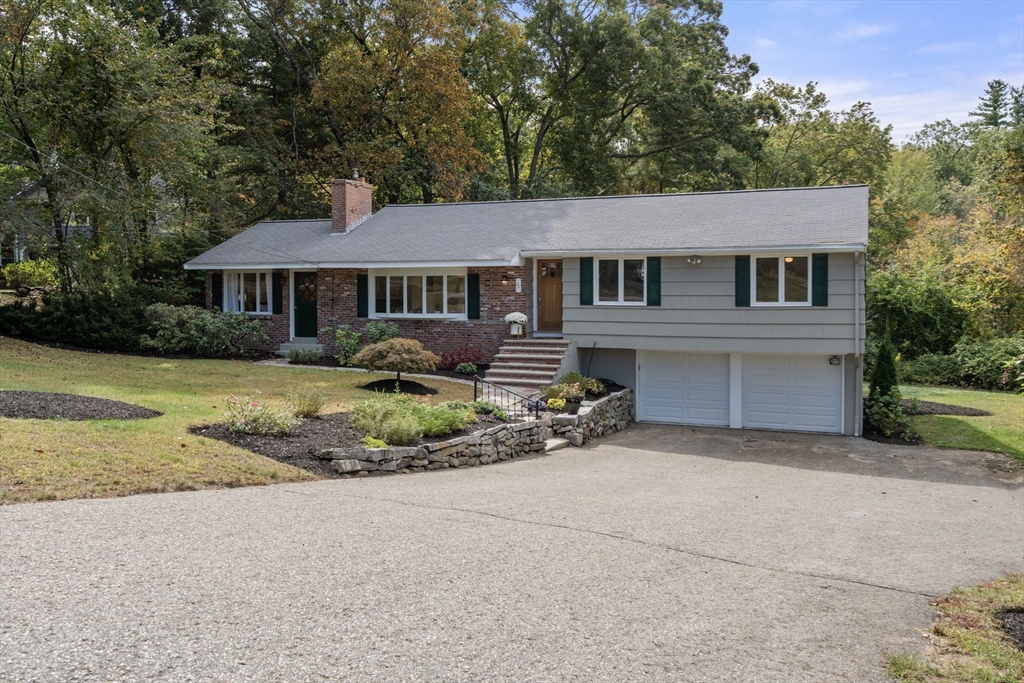 5 Oakwood Road Acton, MA 01720 - Photo 1 of 17 front view of a house with a yard