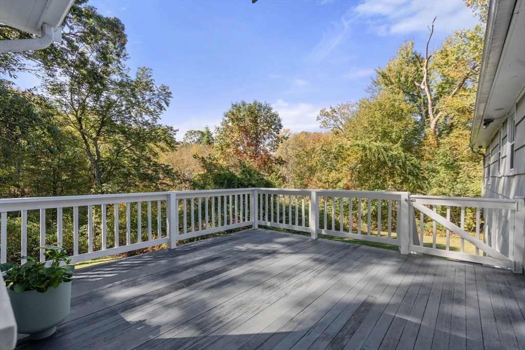 5 Oakwood Road Acton, MA 01720 - Photo 11 of 17 a view of balcony with wooden floor and fence